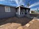 Charming single-story home with covered porch and stone steps at 619 W Cocopah St, Phoenix, AZ 85003