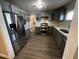 Modern kitchen features stainless steel appliances, sleek countertops, and ample storage at 619 W Cocopah St, Phoenix, AZ 85003