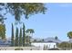 Scenic street view with lush greenery and mountain views in the distance at 6315 E Kelton Ln, Scottsdale, AZ 85254