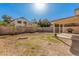 View of backyard featuring a covered patio with built in grill at 6405 W Saguaro Dr, Glendale, AZ 85304