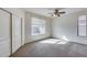 Bedroom with closet, carpet and window at 6557 W Puget Ave, Glendale, AZ 85302