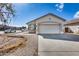 Charming single-story home with a two car garage and desert landscaping at 6557 W Puget Ave, Glendale, AZ 85302