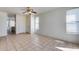 Living room with windows, doors, and tiled floors, creating a bright and inviting atmosphere at 6557 W Puget Ave, Glendale, AZ 85302