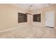 Open dining room showcasing neutral walls, tile floors and a decorative hanging light fixture at 6640 W Honeysuckle Dr, Phoenix, AZ 85083