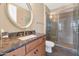 Modern bathroom featuring a glass-enclosed shower and a stylish vanity with sleek fixtures at 7295 N Scottsdale Rd # 1004, Paradise Valley, AZ 85253