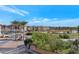 Community view with palm trees and mountain views at 7295 N Scottsdale Rd # 1004, Paradise Valley, AZ 85253