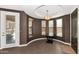 Elegant dining area with a unique chandelier, modern finishes, and lots of natural light at 7295 N Scottsdale Rd # 1004, Paradise Valley, AZ 85253