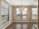 Bright dining room with chandelier, and view to outside at 7295 N Scottsdale Rd # 1004, Paradise Valley, AZ 85253