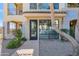 Charming entrance featuring lush greenery, creating a warm and welcoming feel at 7295 N Scottsdale Rd # 1004, Paradise Valley, AZ 85253