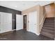 Contemporary hallway with an elevator, a staircase, and access to multiple rooms at 7295 N Scottsdale Rd # 1004, Paradise Valley, AZ 85253