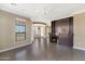 Spacious living room featuring a fireplace, ceiling fan and view to balcony with lots of light at 7295 N Scottsdale Rd # 1004, Paradise Valley, AZ 85253