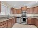 Updated kitchen featuring stainless steel appliances and granite countertops at 744 E Meadow Ln, Phoenix, AZ 85022