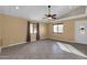 Bright living room with tile floors, neutral paint, and modern ceiling fan at 744 E Meadow Ln, Phoenix, AZ 85022