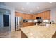 Well-equipped kitchen featuring stainless steel appliances, countertops, and a convenient layout at 7609 W Whitehorn Trl, Peoria, AZ 85383