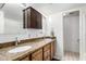 Bathroom features double sinks with granite counters and a cabinet at 7830 E Park View Dr, Mesa, AZ 85208