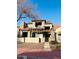 Stylish two-story home with stone accents and a welcoming pergola-covered entryway at 804 W Village Pkwy, Litchfield Park, AZ 85340