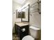 Bathroom with a tile floor, vanity with granite countertop, a sleek sink, and decorative lighting above the mirror at 8434 E Natal Cir, Mesa, AZ 85209