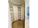 Walk-in closet with custom shelving and storage at 8536 W Rockwood Dr, Peoria, AZ 85382