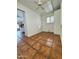 Laundry room featuring tile floors and cabinets at 8536 W Rockwood Dr, Peoria, AZ 85382