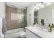 Well-lit bathroom featuring a single vanity, shower over bath, and modern fixtures at 8602 E Mitchell Dr, Scottsdale, AZ 85251