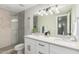 Modern bathroom featuring a double vanity, walk-in shower, and stylish fixtures at 8602 E Mitchell Dr, Scottsdale, AZ 85251