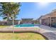 Inviting pool and patio area with outdoor seating, perfect for enjoying sunny days and entertaining guests at 8621 W Via Montoya Dr, Peoria, AZ 85383