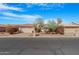 Picture of a single-story home with desert landscaping and a beautiful tile roof at 9214 E Diamond Dr, Sun Lakes, AZ 85248