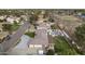 Aerial view showcasing the home's location within a tranquil neighborhood, complete with a private pool and lush landscaping at 9505 S Kenneth Pl, Tempe, AZ 85284