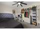 Comfortable bedroom offering a spacious closet, a modern ceiling fan, and a cozy bed at 9505 S Kenneth Pl, Tempe, AZ 85284