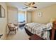 Cozy bedroom featuring a window seat and ceiling fan at 10323 W Carousel Dr, Arizona City, AZ 85123