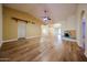 Bright living room boasts wood floors and an eye-catching fireplace feature at 10720 E Sahuaro Dr, Scottsdale, AZ 85259