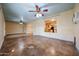 Open living area with concrete floors showing seamless transition to the kitchen at 10720 E Sahuaro Dr, Scottsdale, AZ 85259