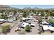 Aerial view of the community showcasing a home with a backyard pool and desert landscaping at 1102 E Brown St, Phoenix, AZ 85020