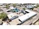 Aerial view of property with pool, RV parking, mature landscaping, and outbuildings at 1102 E Brown St, Phoenix, AZ 85020