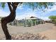 Expansive backyard featuring a pool, gazebo, and mature landscaping with a view of the property at 1102 E Brown St, Phoenix, AZ 85020