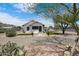 Charming home with desert landscaping and a well-manicured front yard at 1102 E Brown St, Phoenix, AZ 85020