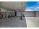 Large carport featuring gravel ground and multiple bays is ideal for outdoor storage and projects at 1102 E Brown St, Phoenix, AZ 85020