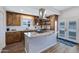 Kitchen featuring granite countertops, stainless steel appliances, and custom cabinetry at 1102 E Brown St, Phoenix, AZ 85020