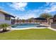 Sparkling pool with palm trees and desert landscaping at 1102 E Brown St, Phoenix, AZ 85020