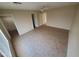 Spacious bedroom with neutral color and multiple access doors at 11184 W Royal Palm Rd, Peoria, AZ 85345