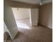 Bedroom featuring tile flooring and an open doorway to a connecting room at 11184 W Royal Palm Rd, Peoria, AZ 85345