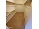 Walk-in closet with a bar to hang clothes and a shelf for extra storage at 11184 W Royal Palm Rd, Peoria, AZ 85345