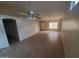 Spacious living room featuring tile floors, ceiling fans and natural light at 11184 W Royal Palm Rd, Peoria, AZ 85345