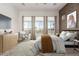 Cozy bedroom featuring natural light from three windows and modern decor accents at 1143 N Quinn --, Mesa, AZ 85205