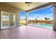 Covered patio area offering views of the pool and backyard at 1143 N Quinn --, Mesa, AZ 85205