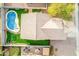 Aerial view of the backyard pool, patio and playset at 11843 W Cambridge Ave, Avondale, AZ 85392