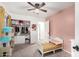 Bright bedroom with a closet and a doll house at 11843 W Cambridge Ave, Avondale, AZ 85392