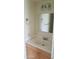 Bathroom featuring a light wood vanity and chrome fixtures at 12245 N 21St Ave # 4, Phoenix, AZ 85029