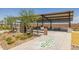 Community picnic pavilion with hopscotch court and landscaped seating areas at 12638 W Parkway Ln, Avondale, AZ 85323