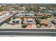 The aerial view of the property features a well-maintained home and solar panels, enhancing energy efficiency at 13019 N 98Th Ave, Sun City, AZ 85351